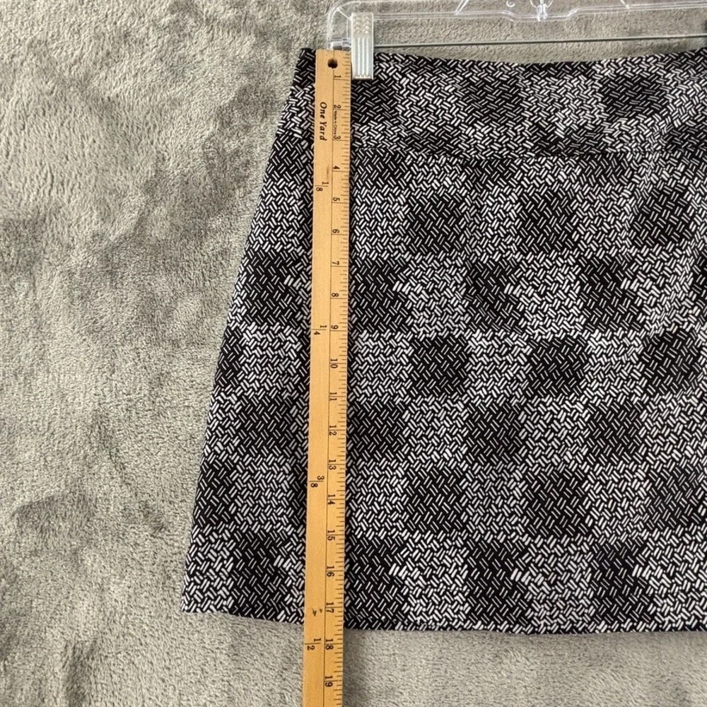 Izod XFG Golf Skort Womens 8 Black White Check Kick Pleat Pocket Stretch Zip‎